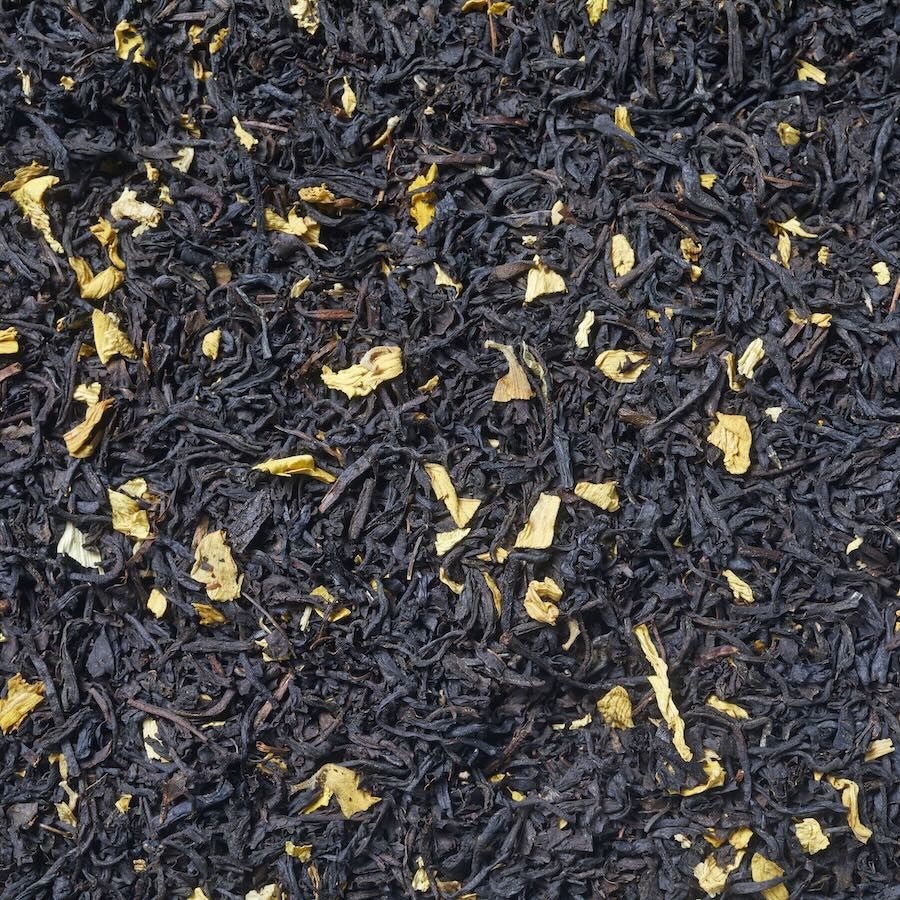 Imágen de Té negro de melocotón. Té negro con pétalos de flores y aroma natural de melocotón.